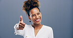 Thumbs up, happy and portrait of woman in studio for approval, success and feedback. Like emoji, yes sign and agreement with african person on background for vote, symbol and promotion icon 
