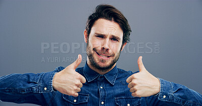 Buy stock photo Thumbs up, smile and comic with portrait of man in studio for approval, success and feedback. Like emoji, yes sign and agreement with male person on background for vote, symbol and promotion icon