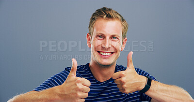 Buy stock photo Thumbs up, smile and vote with portrait of man in studio for approval, success and feedback. Like emoji, yes sign and agreement with male person on background for happy, symbol and promotion icon 
