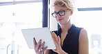 Happy woman, business and creative with tablet for design, communication or research at office. Female person, designer or employee with smile on technology for online news, browsing or schedule app