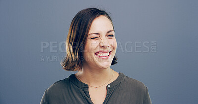 Buy stock photo Wink, support and portrait of woman in studio for secret, agreement and smile. Happiness, feedback and thank you with female person on background for space, discount rumour and well done gesture