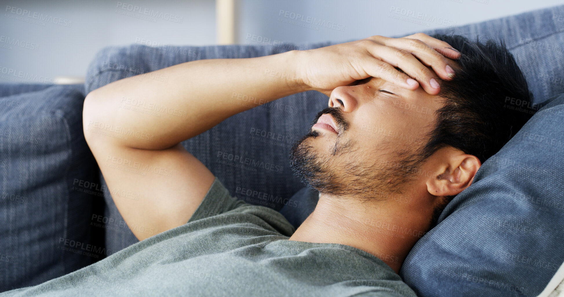 Buy stock photo Tired, man and sleeping with migraine at house for stress,  dream and nap for burnout. Fatigue, male person and headache with brain fog for exhaustion, overworked and anxiety crisis for health issues