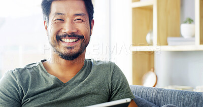 Buy stock photo Tablet, smile and portrait of Asian man on sofa for social media, streaming and networking app. Online post, newsletter and update with person in living room at home for chat, comment and contact