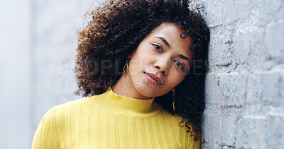 Buy stock photo Woman, portrait and fashion in city by brick wall for pride, confident or attitude in street. Gen z girl, student and outdoor with trendy style, clothes or streetwear on urban sidewalk in Colombia