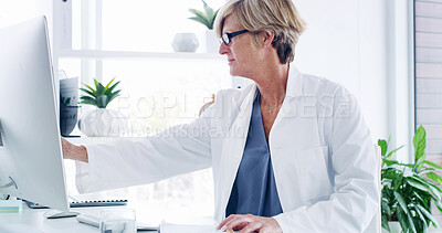 Buy stock photo Woman, doctor and computer with monitor for medical research, discovery or pharmaceutical development. Female person, scientist or professional with technology or notes for science study at clinic