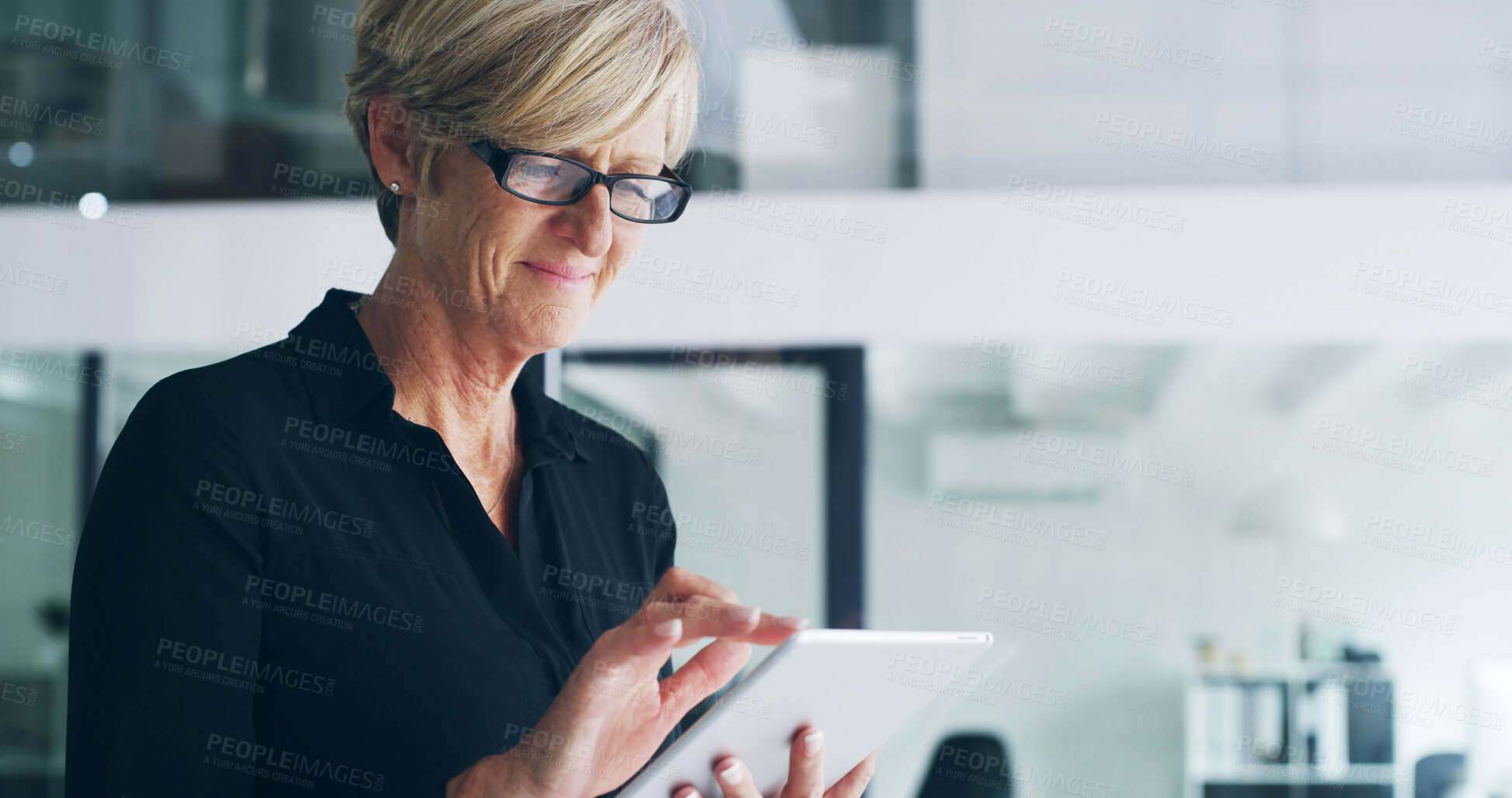 Buy stock photo Mature, happy woman and designer with tablet for creative business, research or schedule tasks at office. Female person, employee or design with smile on technology for online web or app at workplace