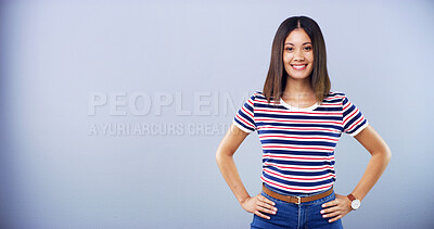 Buy stock photo Portrait, smile and space with woman student in studio for education, learning or university study. College, hands on hips and mockup with happy person on gray background for development or future