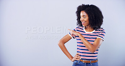 Buy stock photo Studio, happy and woman with pointing to space for promotion deal, offer announcement and advertising. Ambassador, african person and gesture for launch information and coming soon on blue background
