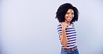Portrait, woman and smile for pointing in studio of university announcement, scholarship news or sign up. African, student and show direction of education steps, information guide and blue background