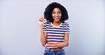 Portrait, woman and student pointing in studio for university announcement, scholarship news or sign up. African, person and show direction with education steps, information guide and blue background