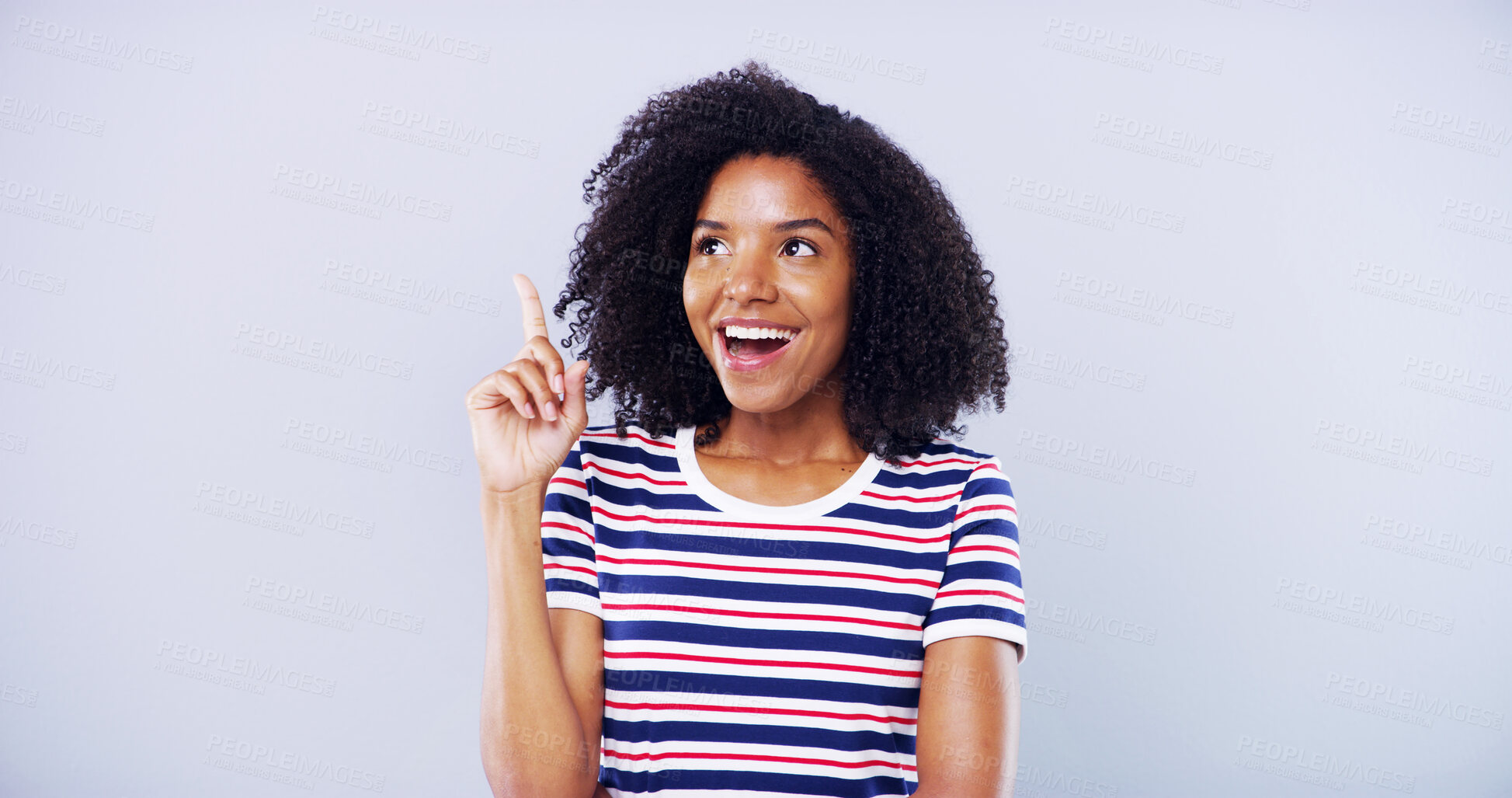 Buy stock photo Shocked, woman and student pointing in studio with college announcement, scholarship news and sign up. African, person and good idea with education offer, information guide and blue background space