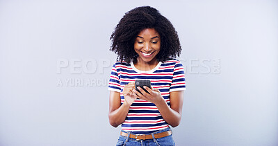 Buy stock photo Excited woman, phone and online in studio with good news for college scholarship, registration and mockup space. Student person, cellphone or happy for feedback, results or success on grey background