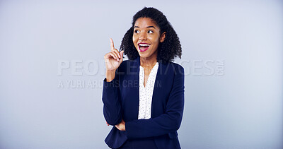 Buy stock photo Smile, pointing and business woman with space in studio for approval on gray background. Announcement, accountant and African model with deal promotion, good idea and agreement for career mockup