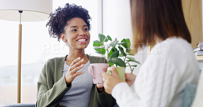 Buy stock photo Home, coffee and women on sofa, conversation and bonding together in living room. People, apartment and friends with cappuccino, gossip and support with comfort, relax and weekend break in lounge