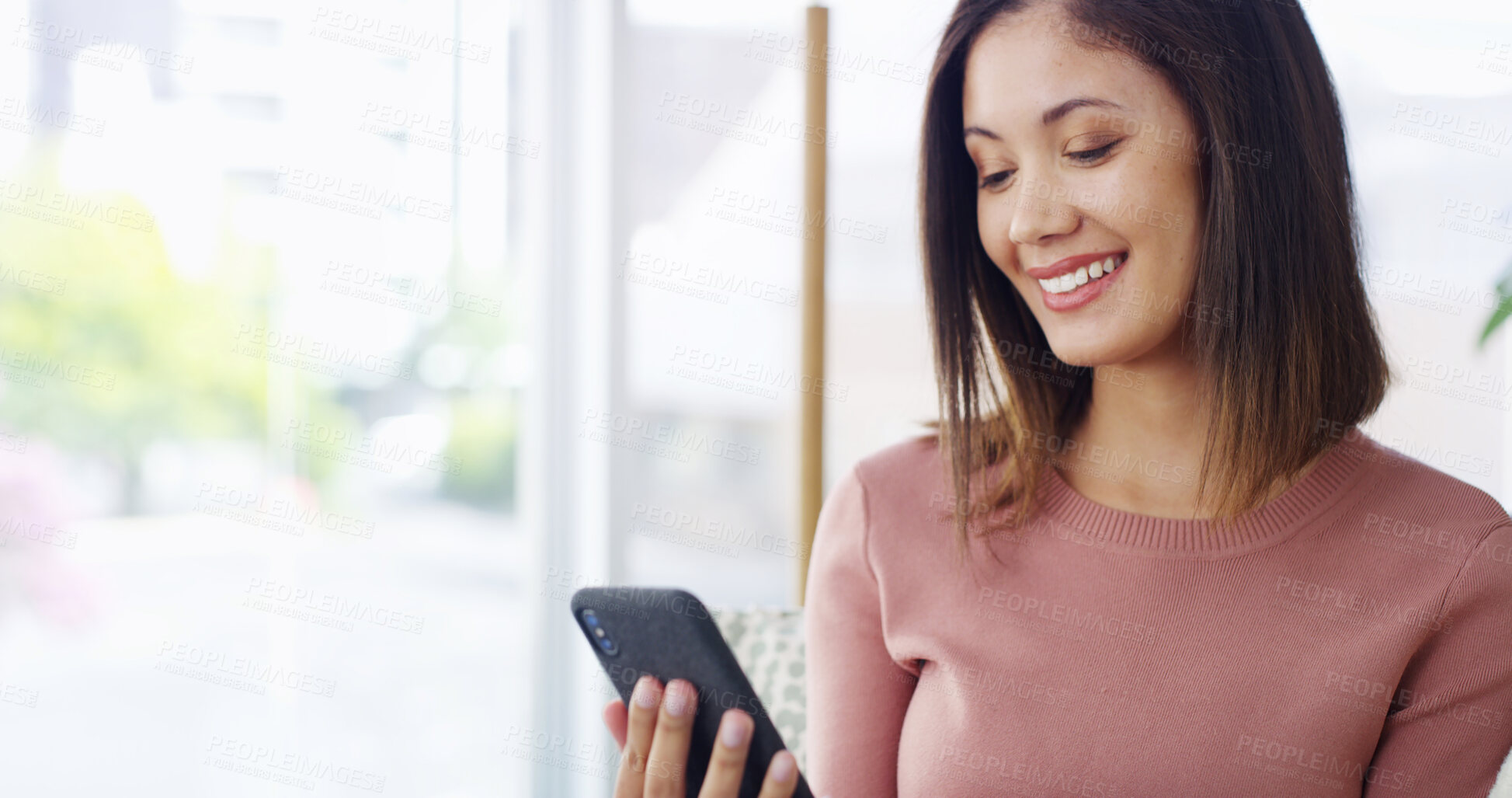 Buy stock photo Smile, smartphone and woman in home for reading blog, news and ebook to relax. Mobile, living room and girl chat for communication, social media post or online notification for dating app on internet