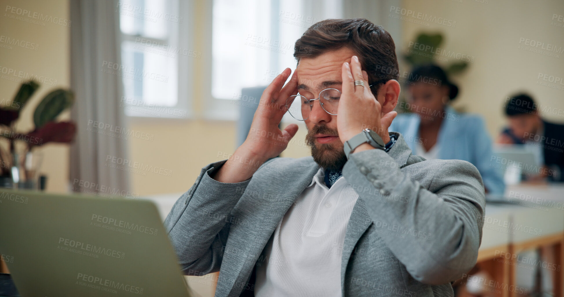 Buy stock photo Laptop, businessman and headache in office for stress, brain fog and fatigue for auditing deadline. Coworking, male person and accountant with massage temple for pain, migraine and financial mistake