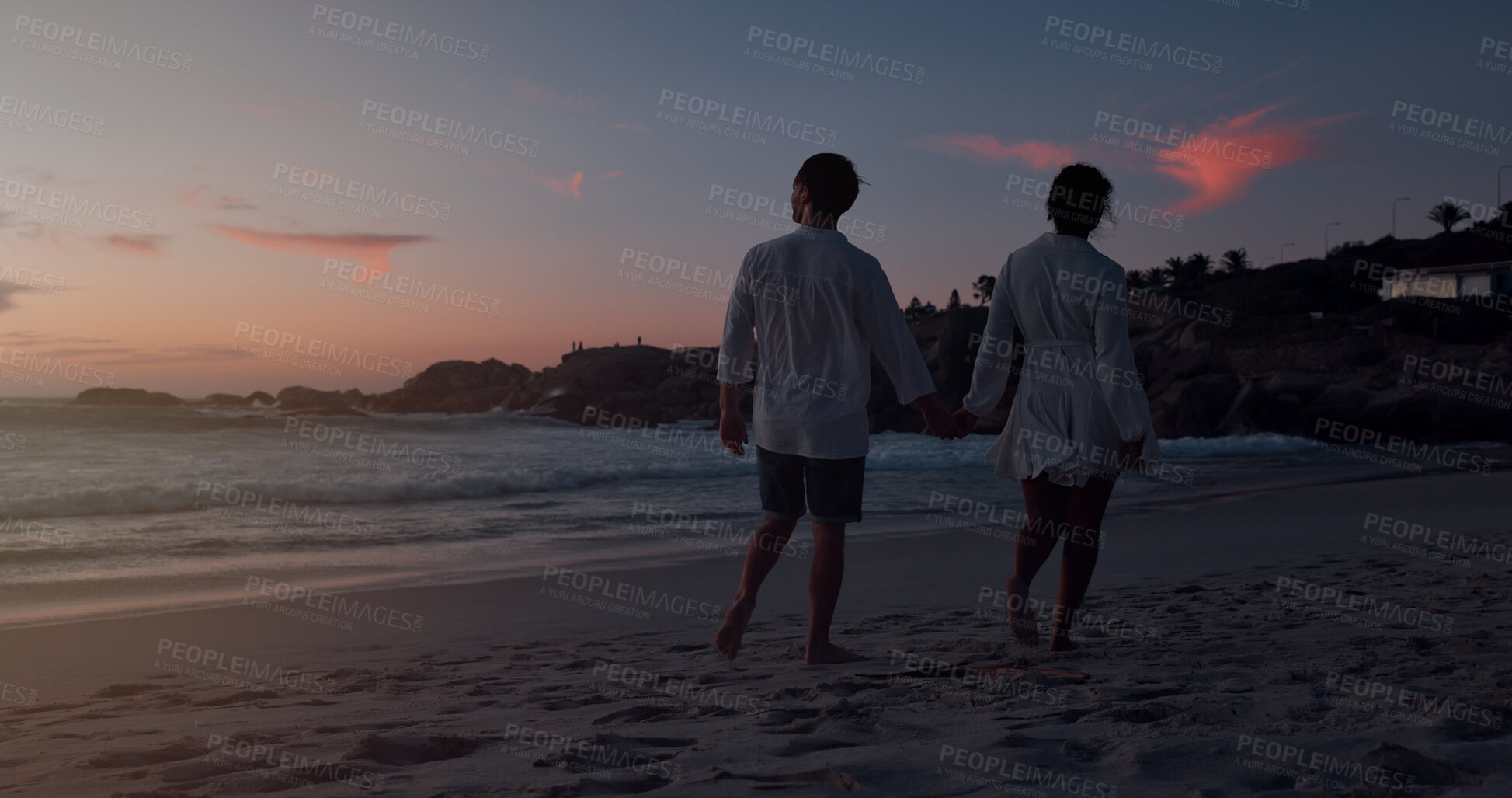 Buy stock photo Couple, holding hands and walking by sunset on beach, vacation holiday and bonding together for date. Back, man and woman with peace for love space, travel adventure and connection in relationship