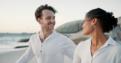 Buy stock photo Vacation, travel and interracial couple at ocean for love, care and healthy relationship. Beach, happy man and woman outdoor for summer holiday, tourism or romantic date with partner for connection