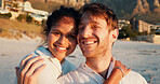 Smile, couple and vacation at beach for love, care and interracial relationship together. Seashore, man and woman embrace outdoor for summer holiday, travel or romantic date with partner in portrait