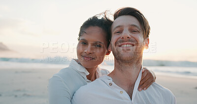 Buy stock photo Happy couple, sunset and portrait at beach on holiday, summer vacation and travel together. Ocean, man and woman embrace outdoor for romantic date, love or care in interracial relationship with space