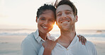 Couple, sunset and smile at beach on holiday, summer vacation and travel together. Ocean, man and woman embrace outdoor for romantic date, love and portrait for interracial relationship with space