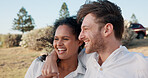 Love, interracial couple and laughing together outdoor for romantic date, relationship support and funny weekend. Happy, people and relax in nature for travel holiday, trust or protection in marriage