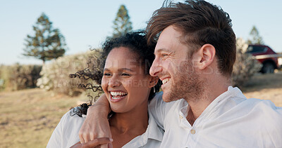 Buy stock photo Love, interracial couple and laughing together outdoor for romantic date, relationship support and funny weekend. Happy, people and relax in nature for travel holiday, trust or protection in marriage