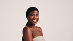 Cosmetics, skincare and face with black woman in studio for dermatology, beauty and glow. Shine, self care and Collagen with person on white background for spa treatment, clean and mockup space