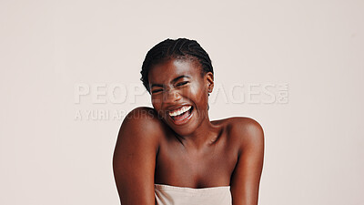 Buy stock photo Beauty, smile and laugh with black woman in studio for dermatology, cosmetics and glow. Shine, self care and Collagen with person on white background for spa treatment, skincare and mockup space