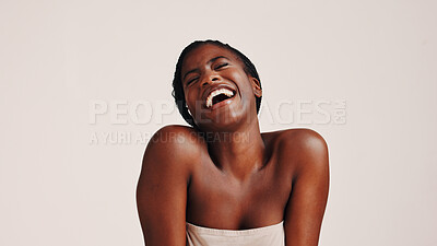 Buy stock photo Beauty, skincare and laugh with black woman in studio for dermatology, cosmetics and glow. Shine, self care and Collagen with person on white background for spa treatment, funny and mockup space