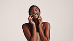 Beauty, skincare and woman with laughing in studio for face treatment satisfaction, glowing skin or dermatology. Mockup space, black person or happy with cosmetic results or funny on white background