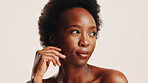 Beauty, skincare and glow with black woman in studio for dermatology, cosmetics and face. Shine, self care and Collagen with person on white background for spa treatment and moisturizing benefits