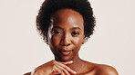 Skincare, natural and portrait of black woman in studio with beauty, health or wellness routine. Happy, face and African female person with dermatology facial treatment for glow by white background.