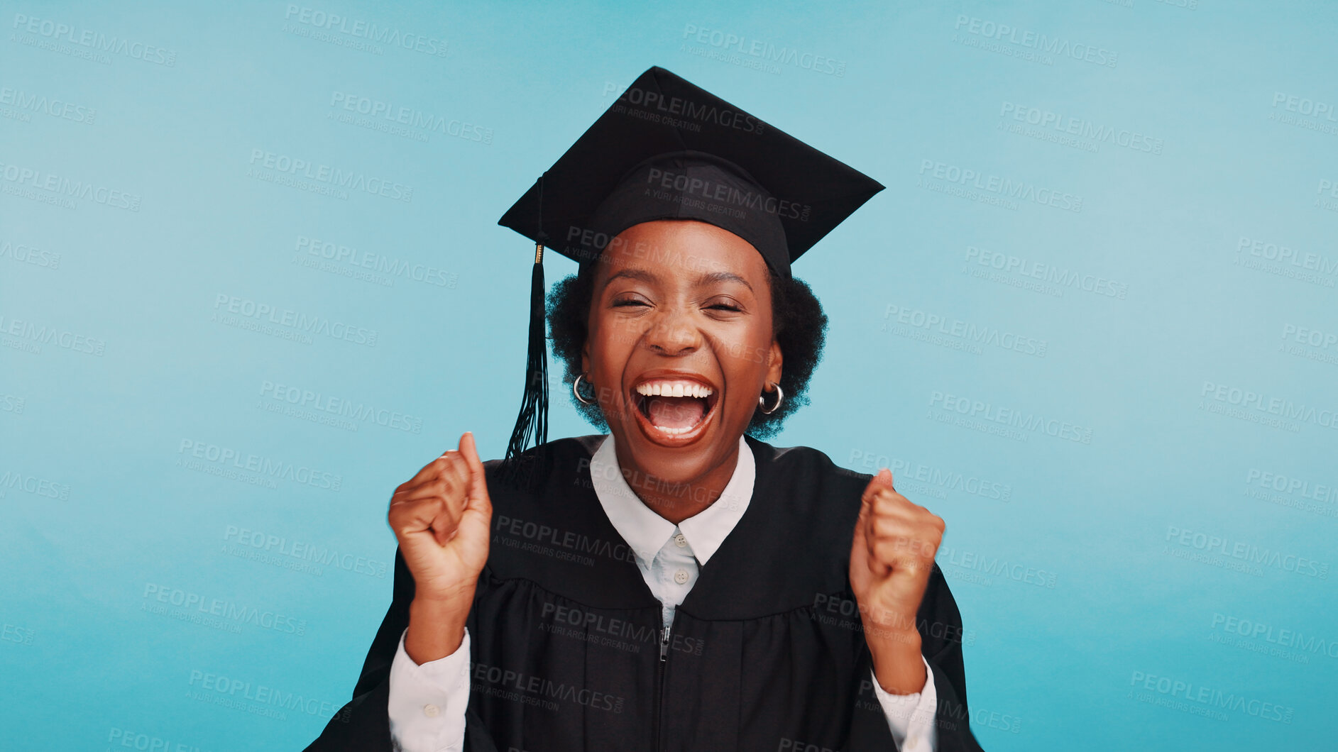 Buy stock photo Black woman, graduation and celebration in studio portrait, education and fist pump for goals by blue background. African girl, student and cheers for diploma, success and achievement in Nigeria
