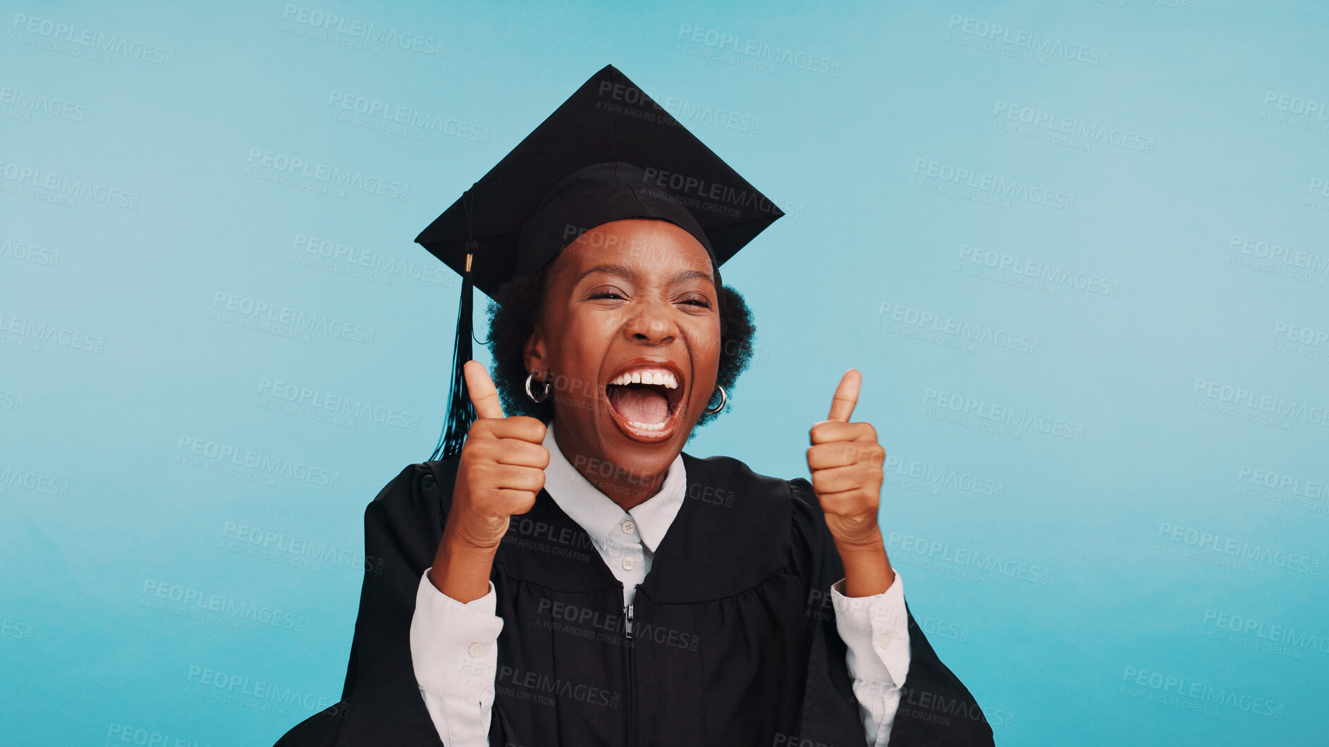 Buy stock photo Graduation, success and woman with thumbs up, happiness and excited for achievement, university and studio. Blue background, college and black person with gesture, student or smile for accomplishment
