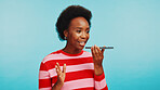 Speaker, phone and black woman in studio for communication, recording audio and voice note. Happy, contact and person on smartphone call for speaker, networking and communication on blue background