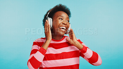 Buy stock photo Studio, black woman and happy with music for dance, hip hop and confidence with audio track. Mockup space, female dancer or energy with radio for song, sound or headphone to listen by blue background