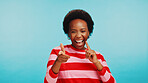Studio, black woman and portrait with pointing for decision, opinion and selection with confidence. Mockup space, female person and happiness with you gesture for choice, vote and blue background