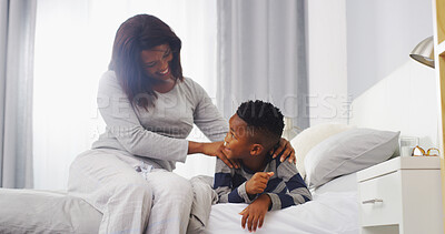Buy stock photo Bonding, mom and child in bedroom, affection and black family in house, conversation and massage for boy. Home, woman and love for son in morning, relax and parent with kid in apartment or smile