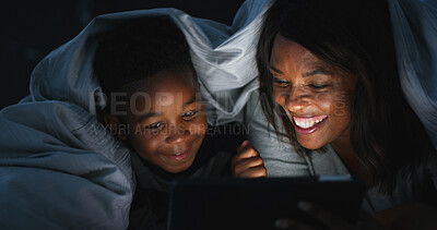 Buy stock photo Bedroom, child and mom with tablet, movies and black family with tech for streaming, online or house. Bonding, woman and watching cartoons with kid, night and love for series in home or entertainment