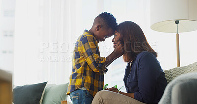 Buy stock photo Bonding, family and mom with child on sofa in home for mothers day, greeting or morning together. Happy, care and African woman with boy for forehead touch with connection or security in living room