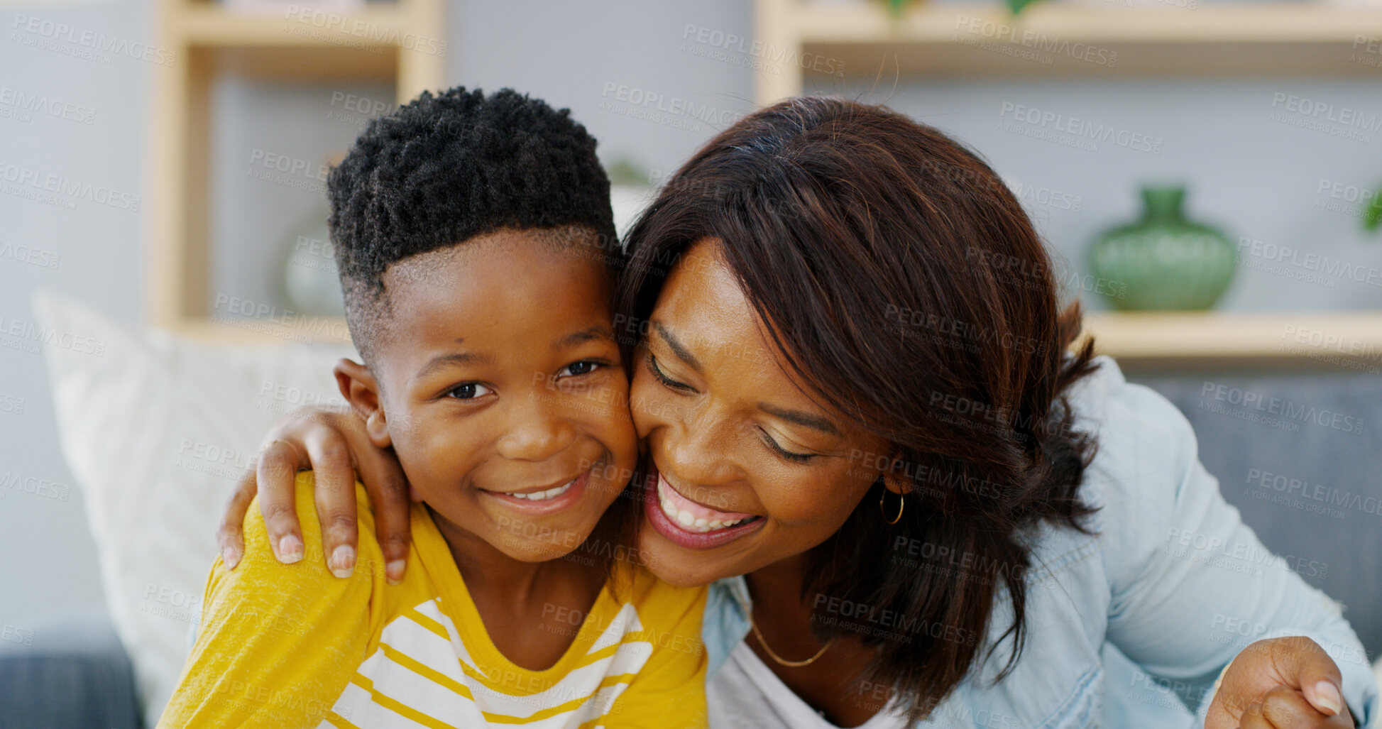 Buy stock photo Smile, mother and hug child in home for love, care and family bonding together. African kid, mom and embrace boy in living room for connection, support and healthy relationship with single parent