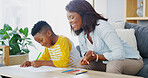 House, mom and child with homework, writing and studying with son in living room, smile and care for boy. Home, woman and kid with notebook in lounge, knowledge or family in apartment with assignment