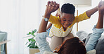 Airplane, mom and child in living room, smile and games for black family in house, love and fun for boy. Apartment, woman and playing with son in lounge, mother and happy with kid on couch or relax