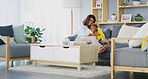 Home, mother and son on sofa, hug and bonding together with comfort, happiness and parent. Black family, mama and boy on couch, embrace and support in living room, weekend break and relationship