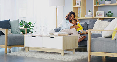 Buy stock photo Home, mother and son on sofa, hug and bonding together with comfort, happiness and parent. Black family, mama and boy on couch, embrace and support in living room, weekend break and relationship