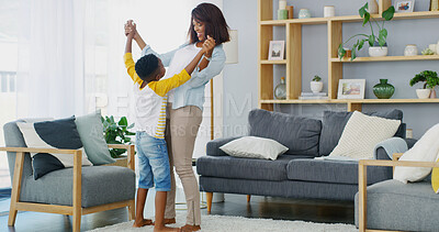 Buy stock photo Home, dancing and mom with son, love and bonding together with fun in living room. Black family, parent and mother with boy, movement and happiness with care, game and weekend break with joy