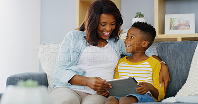 Buy stock photo Tablet, relax or mother with kid on sofa playing, educational game or online for learning. Happy, bonding or mom with boy child on digital technology for entertainment in living room in home together