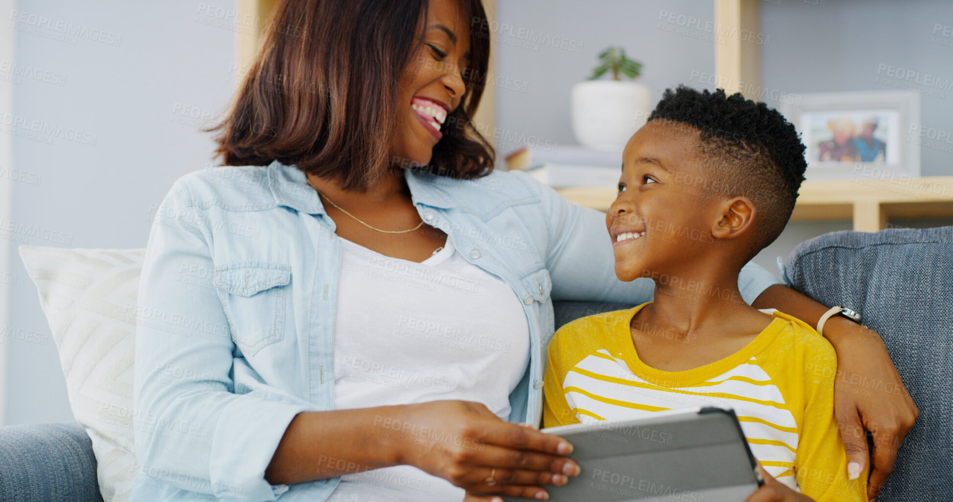 Buy stock photo Tablet, bonding and mother with child on sofa playing educational game online for learning. Happy, relax and mom with boy kid on digital technology for entertainment in living room in home together.