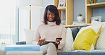 Home, credit card and black woman with tablet, online shopping and investment with payment in lounge. African person, apartment and lady with tech, transactions and savings goals with banking app